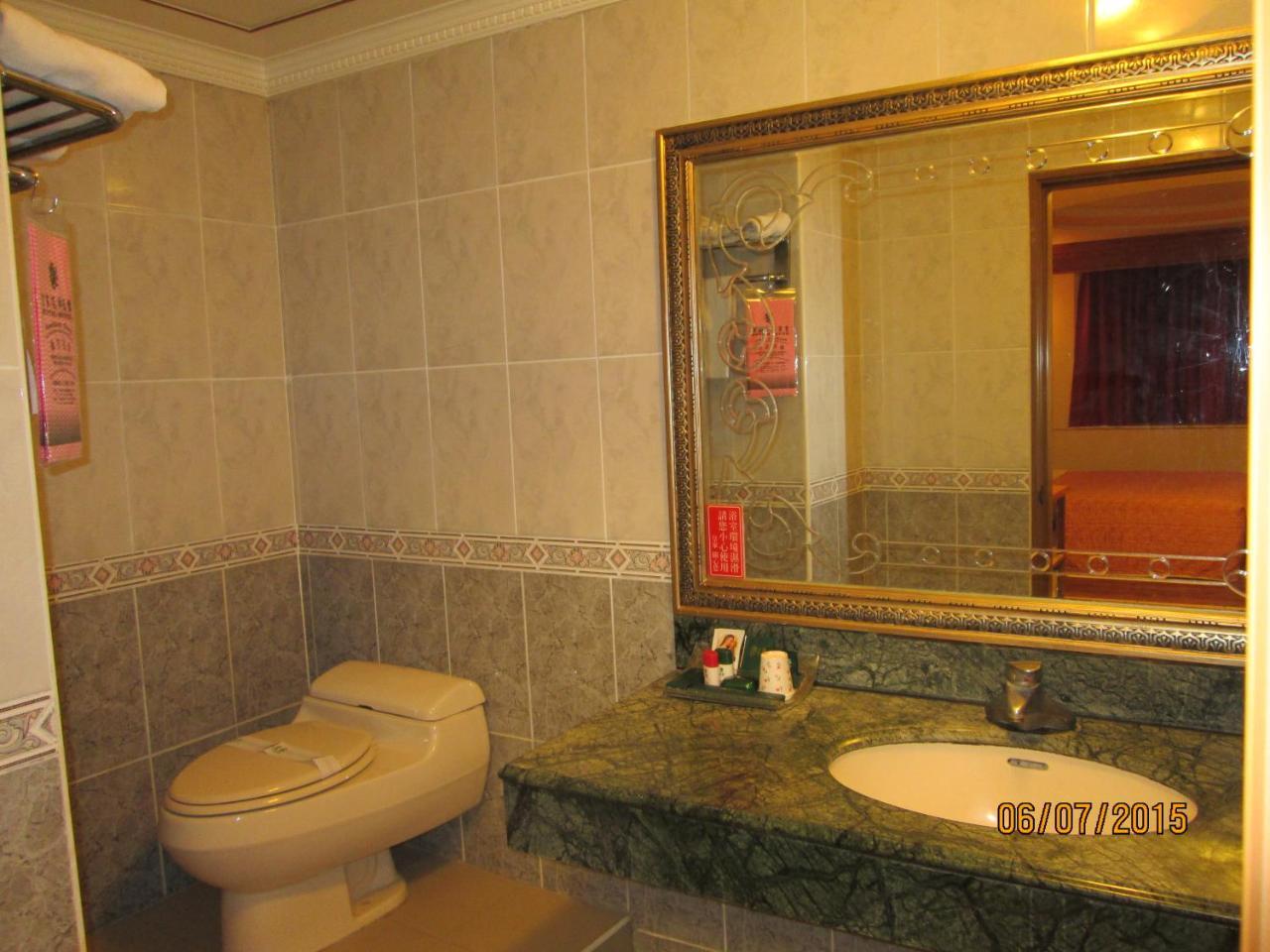 Huangjia Motel ไถหนาน ภายนอก รูปภาพ